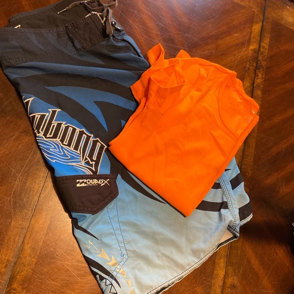 Billabong Blue and Black Board Shorts with Tribal Patterns - Picture 5 of 5